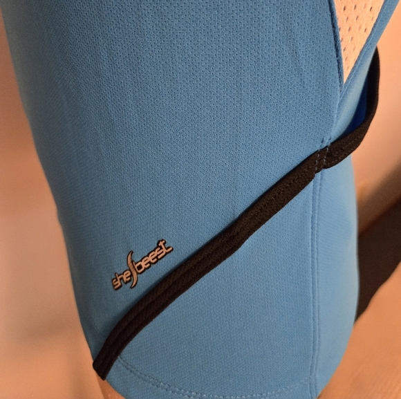 SHEBEEST SKY BLUE & BLACK BICYCLING ATHLETIC TOP. SIZE SMALL. - Picture 6 of 11